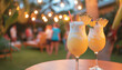 Pina Colada Cocktails with Pineapple Garnish in an Outdoor Party Setting