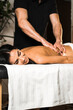 © Darius - A professional masseur gives a massage to a young woman.Beautiful young woman enjoying massage in spa salon. Beauty treatment, skin care, wellbeing.Concept of massage and spa treatments