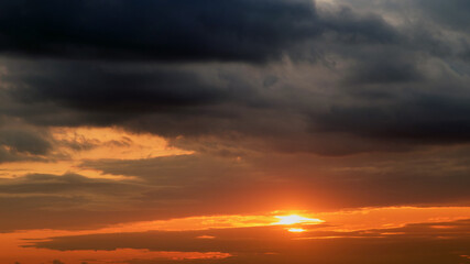 Wall Mural - Dark dramatic sky with cloud at sunset background. Sky clouds.