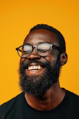 Aufkleber - A man with a beard and glasses smiling. Suitable for various purposes