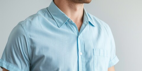 Poster - A man wearing a blue shirt and tie. Suitable for professional and formal occasions