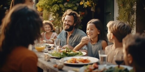 Aufkleber - A group of people gathered around a table, enjoying a meal together. Perfect for illustrating social gatherings or family meals