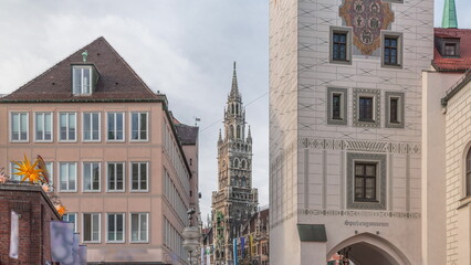 Wall Mural - Marienplatz with the old Munich town hall, Rathaus-Glockenspiel and the Talburg Gate timelapse, Bavaria, Germany.