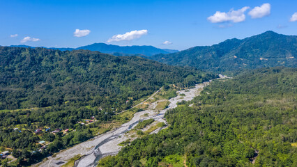 Wall Mural - Aerial view of melangkap river and mount kinabalu on background
