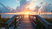Panoramic View Of The Footbridge On The Beach At Sunrise