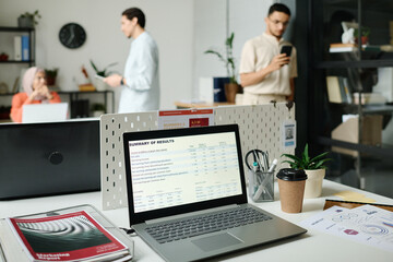 Aufkleber - Screen of desktop computer with summary of results standing on workplace of modern broker or economist in coworking space