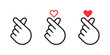 © Hunter Leader - Hands making mini heart symbol icon. Mini finger heart line icons set. Hand with love icon vector illustration
