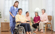 © Ann Rodchua - Selective focus Asian female nurse, doctor wearing uniform, smiling with happiness and warmth, taking care senior healthy wellbeing old aging woman on wheelchair. Nursing home, Aging Society Concept.
