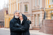 © luengo_ua - Portrait of happy smiling retired couple wearing coats outdoors