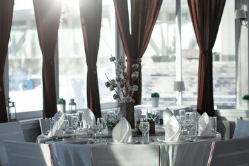 Festive table decoration with flowers and other elements