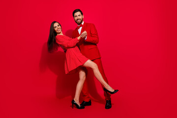 Aufkleber - Full size photo of lovely young couple dance have fun surprise valentine day wear trendy elegant outfit isolated on red color background