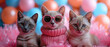 A stylish and adorable group of feline friends, each sporting pink glasses and cozy sweaters, showcasing the playful and endearing nature of domestic cats