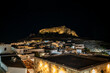Evening view of the ancient Acropolis of Lindos and snow white houses.