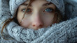 Young woman basking in warm knitted plaid, close up shot. Frozen female trembles with cold suffer from unbearable cool temperature inside, shivers, feels unwell. Cosiness, central heat problem concept