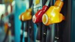 © Ibad - Close up of diesel and petrol fuel pistols at a gas station. The fuel crisis continues and the cost of fuel is going up