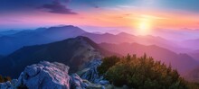 The Breathtaking Beauty Of Nature With This Stunning Mountain Landscape Scenery Stock Photo. As The Sun Sets, It Casts A Warm Golden Glow Over The Majestic Peaks, Creating A Mesmerizing Scene.