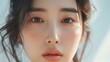 © JW Studio - Cropped beautiful female Asian beauty care models face front close up. Calm relaxed young Korean woman with soft clean perfect skin looking at camera.