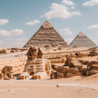 Majestic Sphinx and Pyramids of Giza under Sunny Skies