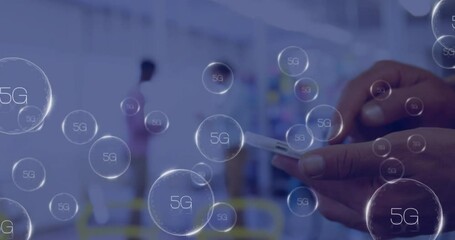 Poster - Animation of 5g icons over hands of caucasian man using smartphone