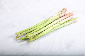 Raw green uncooked asparagus sprout