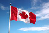 Fototapeta Tulipany - Canadian flag in front of a blue sky (A.I.-generated)