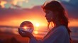 A young woman holding a glass globe at sunrise, embodying terragen.