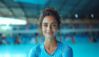 A female athlete portrait in the swimming pool stadium
