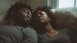 Sleepy black couple missed alarm ring in the morning indoor