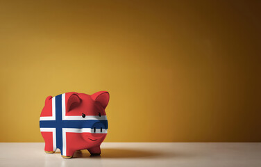 Wall Mural - Piggy bank with painting of Norway flag. The problem is in the economy. Economic crisis. Saving money concept.