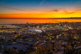 Fototapeta  - GENOA, ITALY, DECEMBER 18, 2023 - Aerial view of the port of Genoa at sunset, Italy