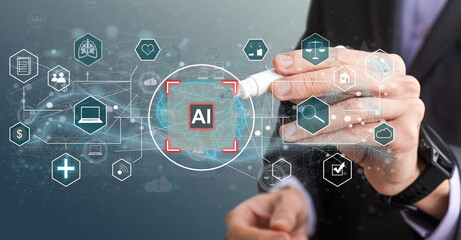 Leinwandbilder - Artificial intelligence concept businessman holding ai on computer screen to using for in document management system and data analysis works