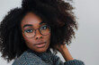 © Oksana_Latysheva - Closeup portrait of beautiful African American woman wearing eyeglasses isolated on white background