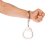 Police handcuffs on hand. arrest concept isolated on white background without shadow with clipping path