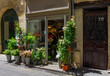 Street with flower shop in Paris, France. Cozy cityscape of Paris. Architecture and landmarks of Paris.