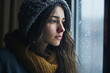 Picture of young woman looking through a rainy window with tears streaking down concept of loneliness and depression generative AI