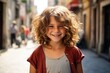 © Stocknterias - Portrait of a cute little girl with curly hair on the street