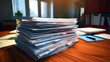  A stack of paperwork on a desk, including mortgage loan application forms, financial statements, and property documents.