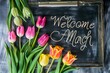Welcome to spring illustration with tulips and writing on blackboard