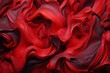 Abstract background of red wavy flowing fabric