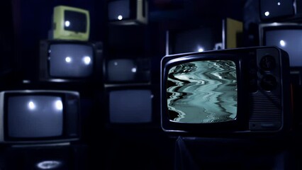 Wall Mural - an old television turning on green screen with static noise. dark tone. zoom in. 4k resolution.