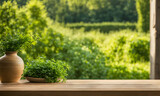 Fototapeta Dziecięca - An empty wooden table in the foreground, with a blurred country house in the background against a verdant garden setting