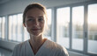 © EliteLensCraftImages - Confident Mid-Age Danish Female Doctor or Nurse in Clinic Outfit Standing in Modern White Hospital, Looking at Camera, Professional Medical Portrait, Copy Space, Design Template, Healthcare Concept