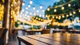 Fototapeta  - blurred background of restaurant with abstract bokeh light lights decoration party event festival holiday blur background outdoor string lights digital