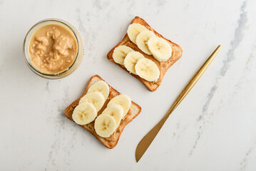 Wall Mural - Peanut butter sandwich with fresh banana slices