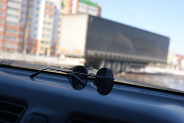 sunglasses in the car