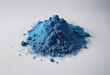 Pile of blue powder isolated on white background