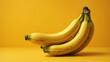 Bananen vor gelben Hintergrund