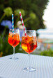Two aperol spritz on a summer evening in a mediterranean pub