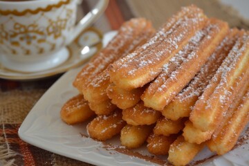 Poster - Churros a beloved treat in Spain Mexico and other countries are fried dough enjoyed with hot chocolate or coffee