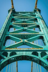 Poster - A view of the top of a bridge from below. Suitable for architectural, urban, or transportation themes